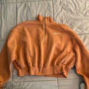 Large orange Nike crop top half zipper sweater